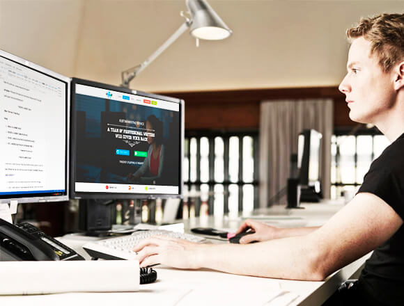 Looking at a computer monitor when writing a critical analysis essay